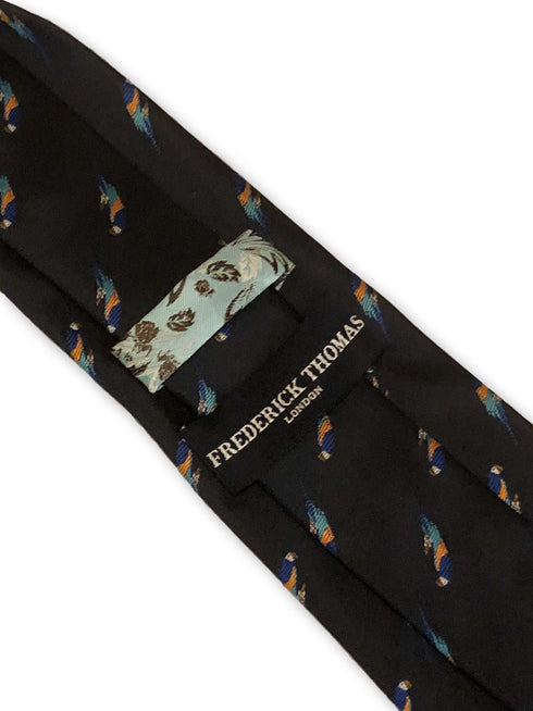 navy blue tie with blue macaw parrot print design